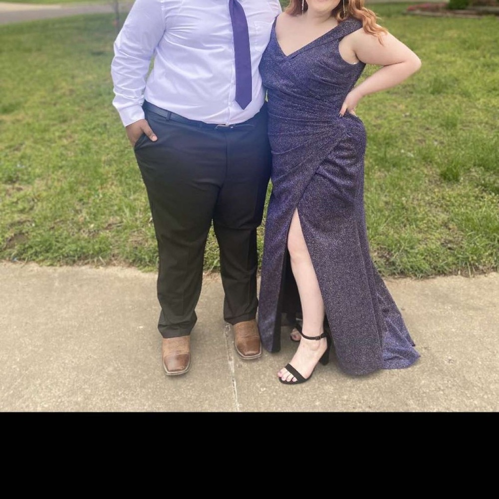 Purple Sparkly Prom dress with leg slit.